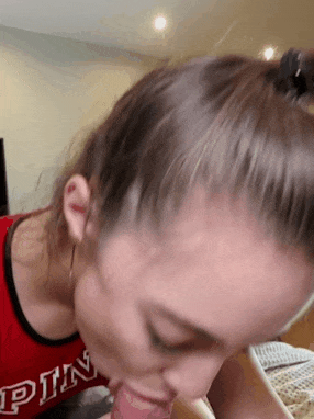 teenager in ponytails guzzles a fountain of jizz - watch more molten amateurs on our blog