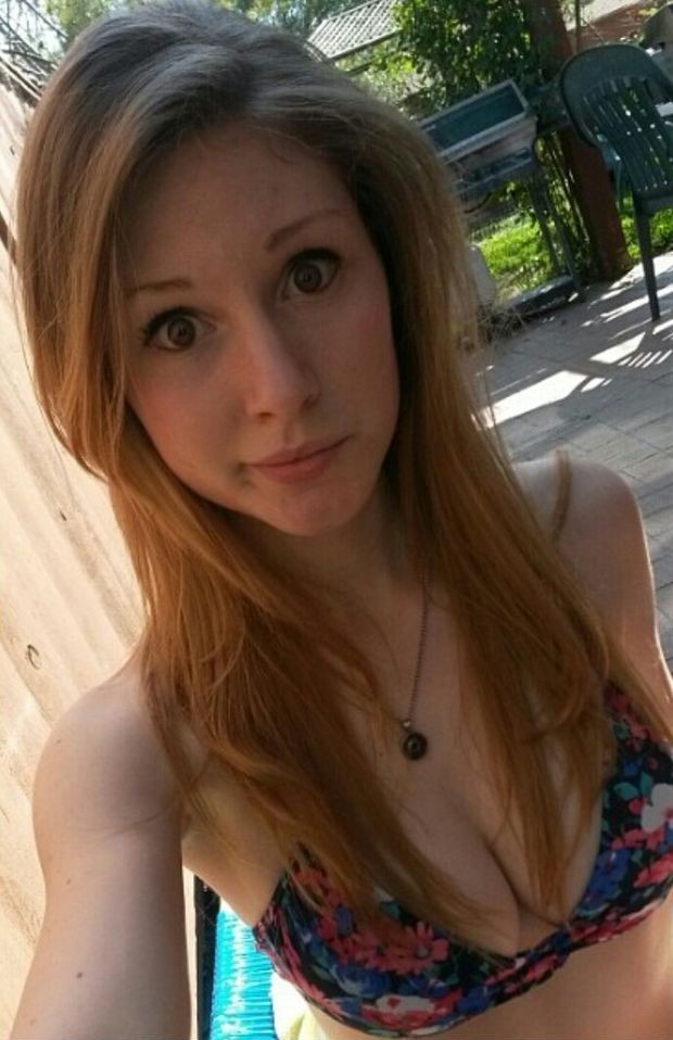 ginger-haired swimsuit teenager