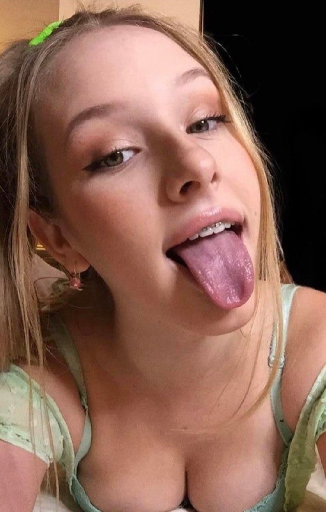 Braces tongue out