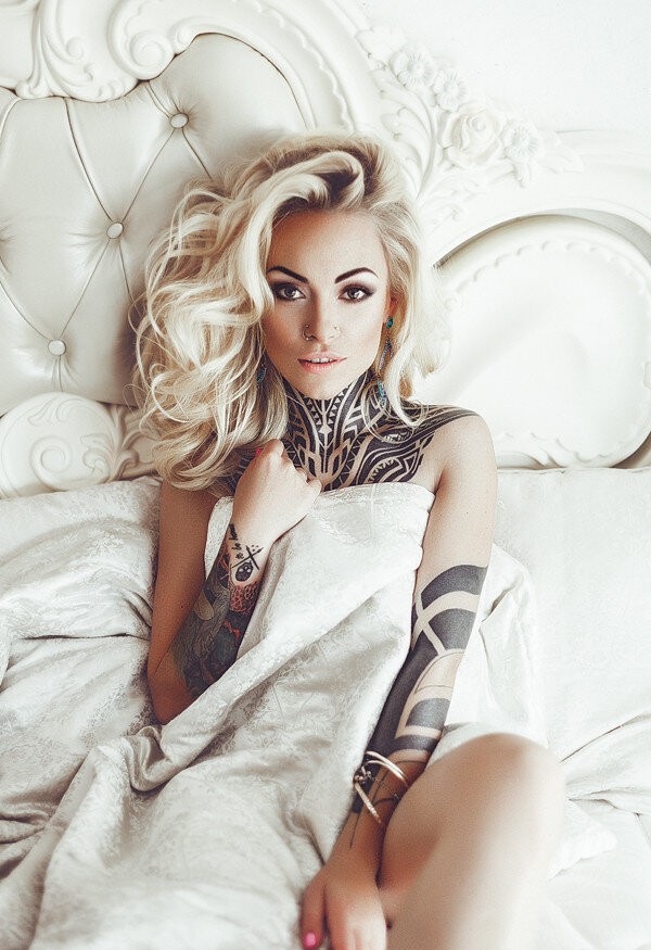 milky sofa with tatted blond.